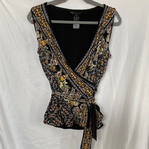 Reversible sleeveless wrap blouse with waist tie. Size M.